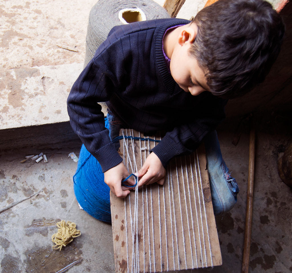 Kiliim's youngest craftsman in the making